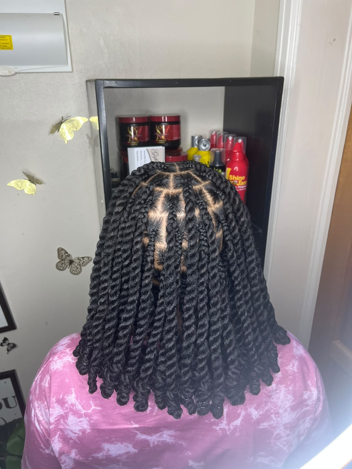 Shoulder-length textured twists