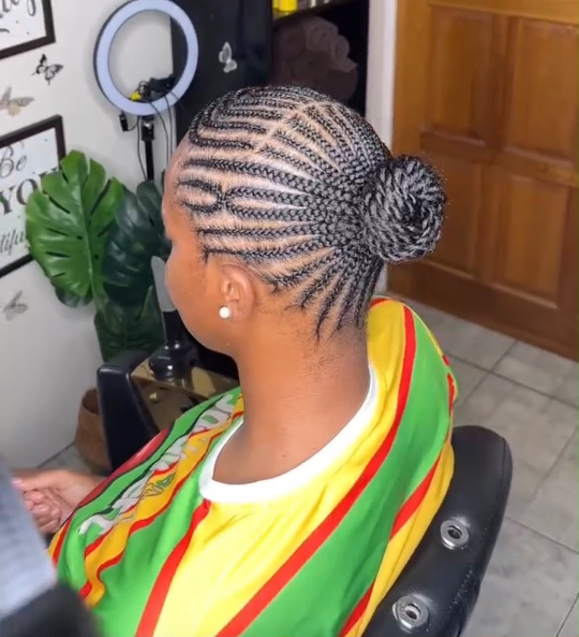 Cornrows into a braided bun
