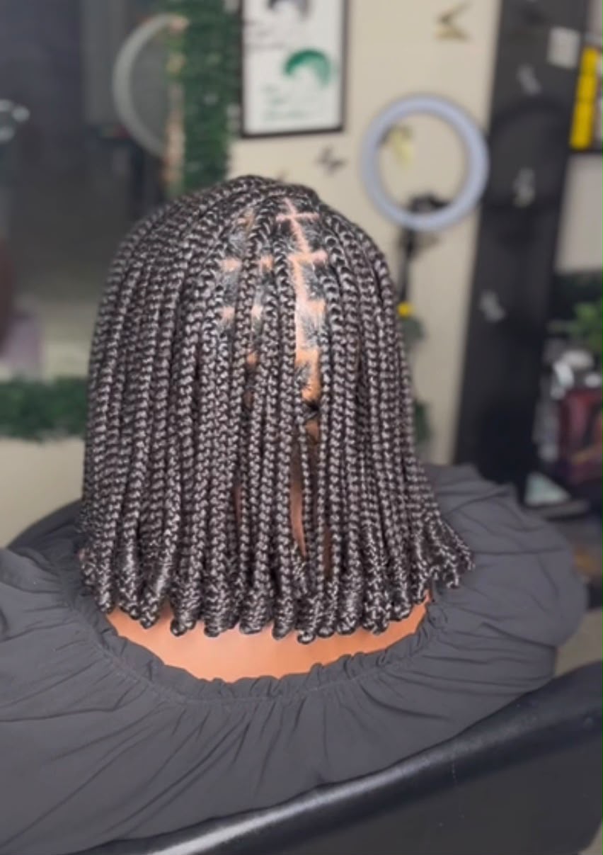 Neat shoulder-length braids